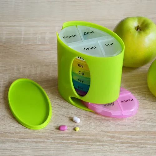 Органайзер для таблеток на 7 днів, овальний, зелений, з поліпропілену, 96х60х120 мм