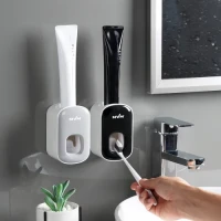 Диспенсер для зубної пасти MVM білий/сірий, що клеиться, з ABS пластику, 113х60х70 мм