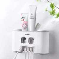 Подвійний диспенсер для зубної пасти з тримачем для щіток та склянками, білий/сірий, 155х80х250 мм, ABS пластик