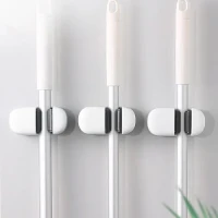 Тримач для швабри MVM білий, що клеиться, 98х58х48 мм, ABS-пластик, універсальний аксесуар